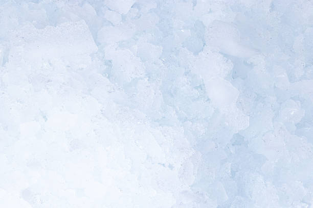 Crushed ice texture background. Pile of crushed ice cubes stock photo
