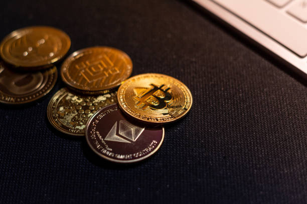 Cryptocurrency coins in close up. Bitcoin, Ethereum, Binance. São Paulo, Brazil - Circa February 2022: Cryptocurrency golden coins in close up. Bitcoin, Ethereum, Binance. binance stock pictures, royalty-free photos & images