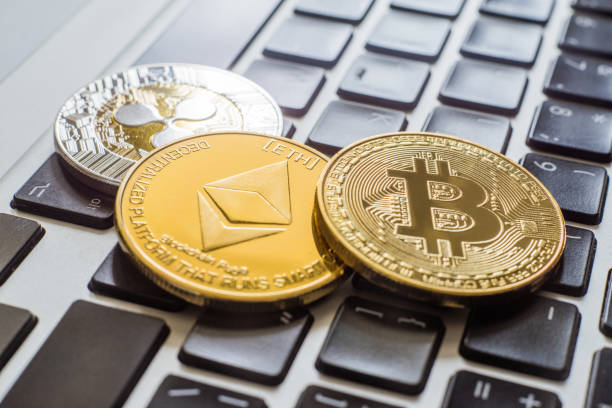 cryptocurrency coins - Ripple, Bitcoin, Ethereum Russia, Moscow, 7 February 2018: cryptocurrency coins - Ripple, Bitcoin, Ethereum  With Ethereum  stock pictures, royalty-free photos & images