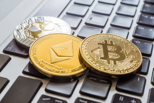 cryptocurrency coins - Ripple, Bitcoin, Ethereum Russia, Moscow, 7 February 2018: cryptocurrency coins - Ripple, Bitcoin, Ethereum With Ethereum stock pictures, royalty-free photos & images