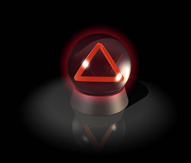 Crystal ball, seeing danger, warning triangle stock photo