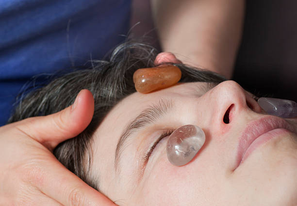 Crystal Healing and Face Massage stock photo