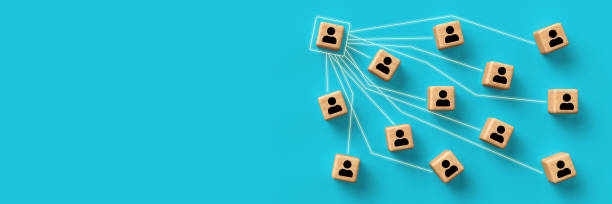 cubes with person symbols and lines symbolizing contact tracing - 3d illustration stock photo