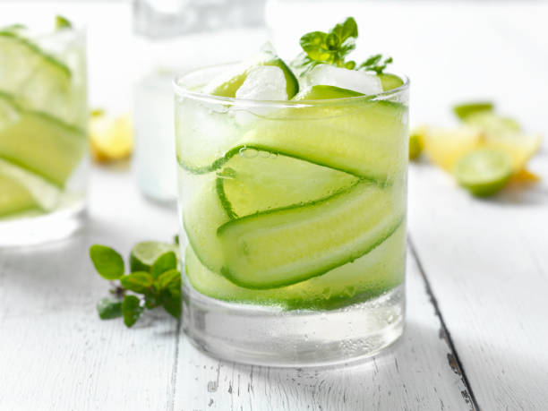 Cucumber, Basil and Citrus Cocktail Cucumber and Basil cocktail with a hint of lemon and lime cucumber stock pictures, royalty-free photos & images