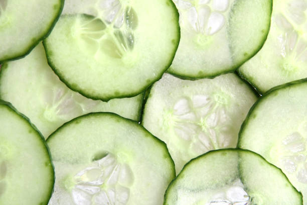 Cucumber slices as background stock photo
