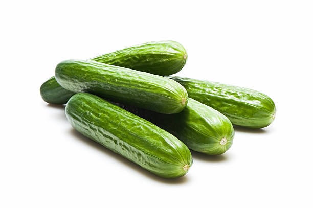Cucumbers Cucumbers isolated on white. More cucumbers... cucumber stock pictures, royalty-free photos & images
