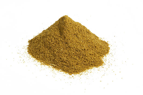 cumin heap A heap of cumin isolated on white cumin stock pictures, royalty-free photos & images