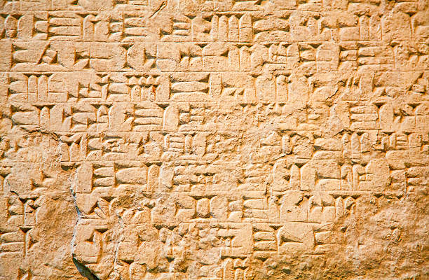 Cuneiform writing Cuneiform writing of the ancient Sumerian or Assyrian civilization in Iraq sumerian civilization stock pictures, royalty-free photos & images
