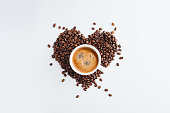 istock Cup of coffee Heart shape coffee beans 1278446540