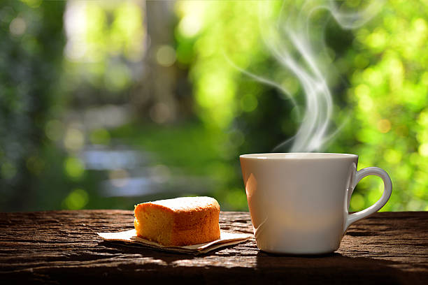 Cup of coffee with cake stock photo