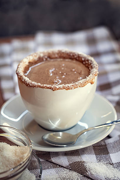 Cup of coffee with chocolate and coconut stock photo