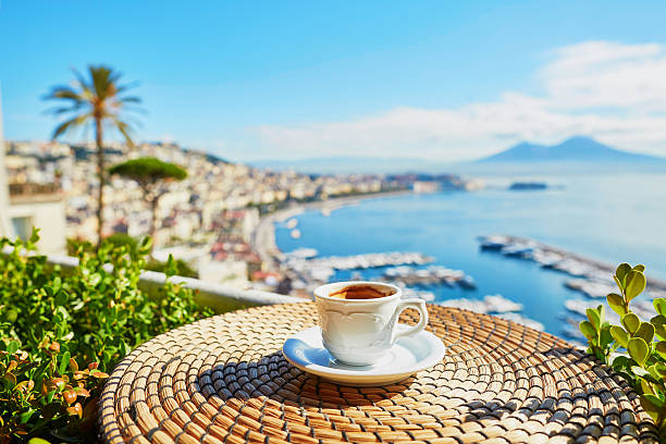 cup of espresso coffee with view on vesuvius - napoli stockfoto's en -beelden