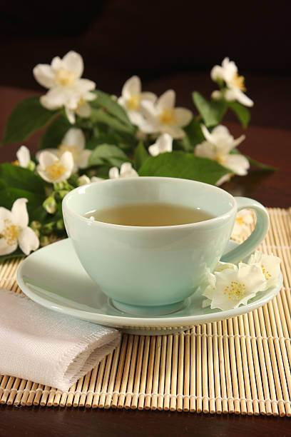 Cup of jasmine tea stock photo