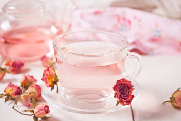 Cup of roses tea. Healthy herbal detox tea. stock photo