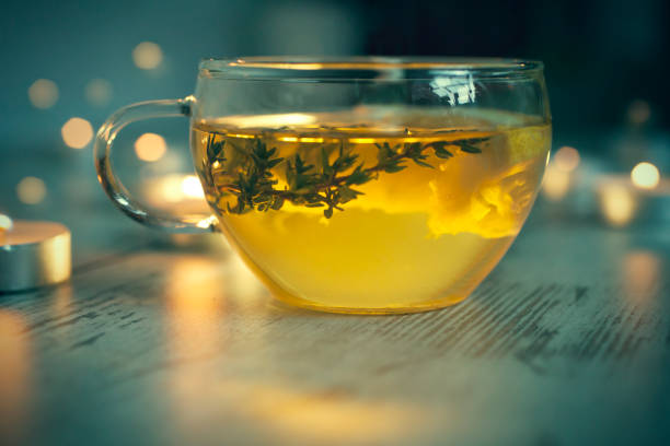Cup of tea Cup of tea, thyme branch, lemon slice thyme photos stock pictures, royalty-free photos & images