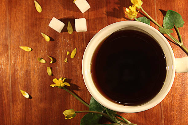 Cup of tea with jasmine flowers stock photo