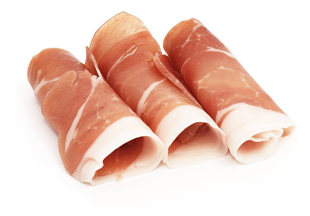 Cured Ham rolls - Prosciutto isolated on white Cured Ham rolls - Prosciutto isolated on white.My other similar images prosciutto stock pictures, royalty-free photos & images