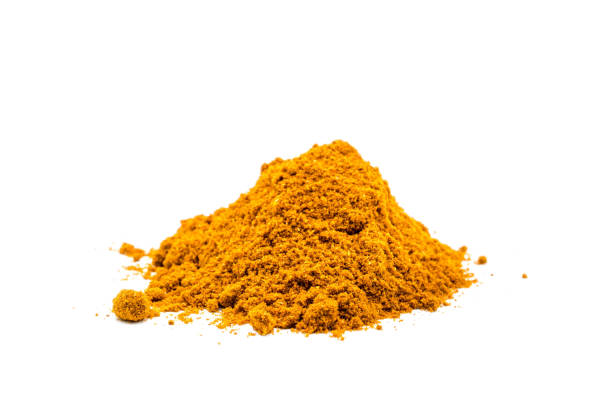 Curry powder isolated on white background Curry powder isolated on white background curry powder stock pictures, royalty-free photos & images