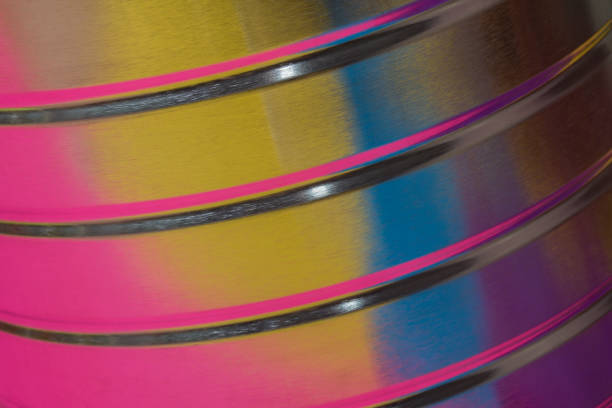 Curved metal surface highlighted in vivid colors stock photo