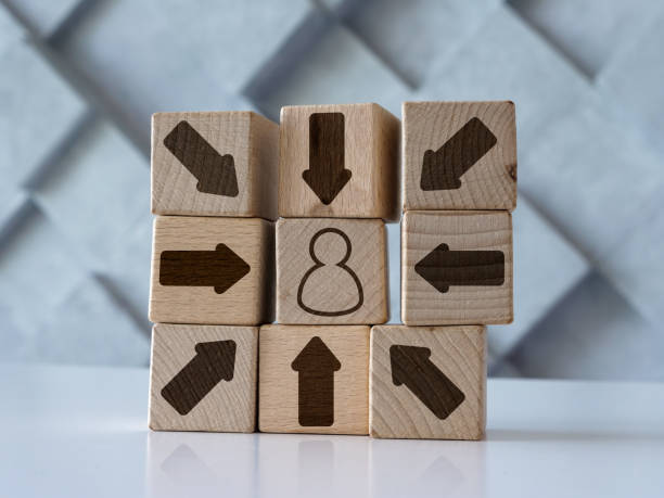 Customer centric concept with cubes, figure and arrows on them. stock photo