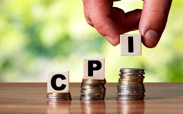 CPI - Customer Price Index word symbol - business concept. Hands put wooden block on stacked increasing coins CPI - Customer Price Index word symbol - business concept. Hands put wooden block on stacked increasing coin. cpi stock pictures, royalty-free photos & images