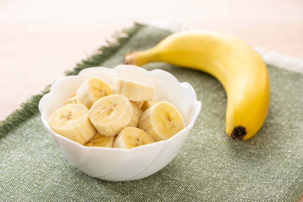 Cut bananas in the plate Cut bananas in the plate ripe stock pictures, royalty-free photos & images