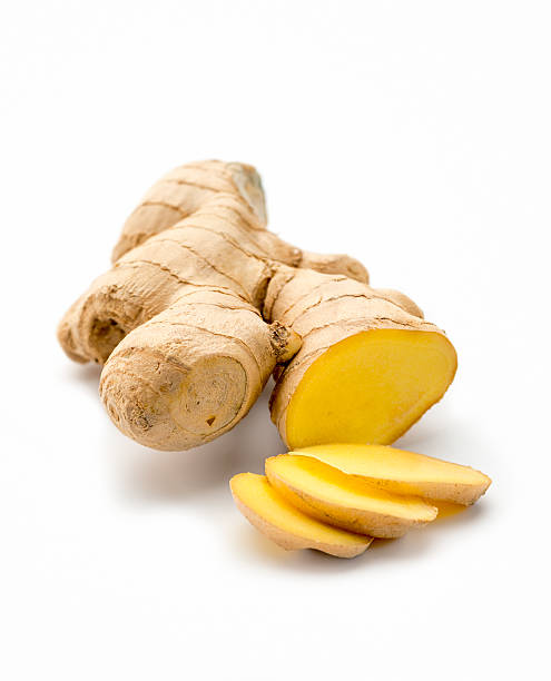 Cut Ginger root isolated on white background stock photo