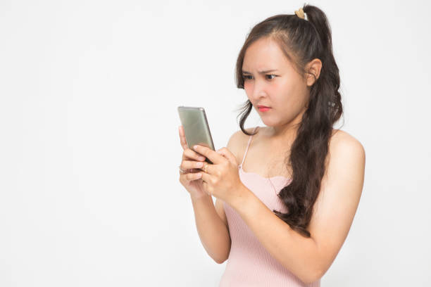 Cute Asian woman is angry and chatting about something for social media concept stock photo