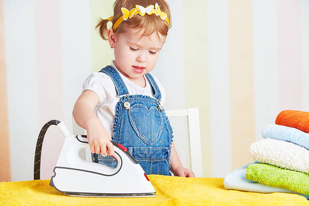 147 Cute Little Girl Ironing Clothes Stock Photos, Pictures & Royalty-Free  Images