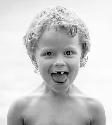 Cute Boy Making Faces Stock Photo - Download Image Now - iStock
