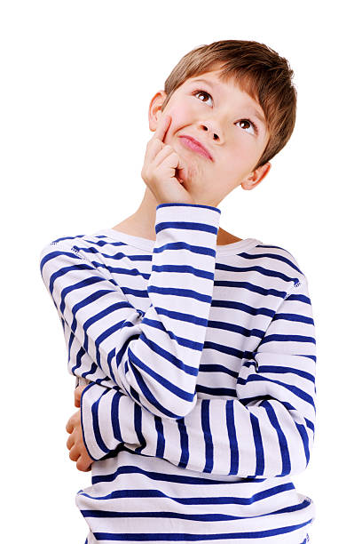 Cute Confused Young Boy stock photo
