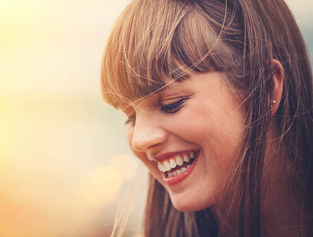 Cute Girl Smiling Portrait of teenager smiling. bangs hair stock pictures, royalty-free photos & images