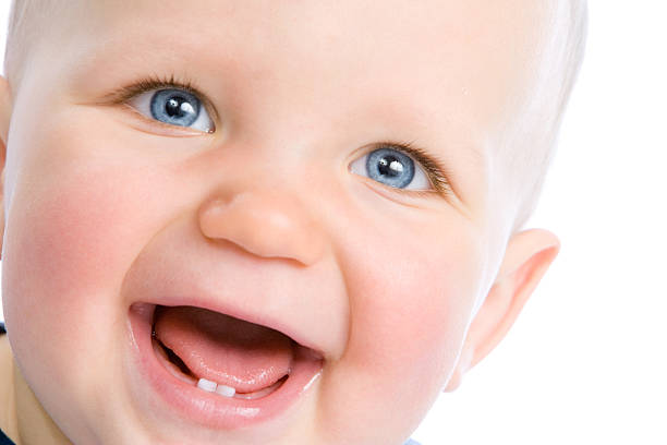 Cute infant laughing  deciduous teeth stock pictures, royalty-free photos & images