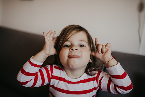 Cute Little Girl Sticking Her Tongue Out Stock Photo Cute Little Girl Sticking Her Tongue Out Stock Photo