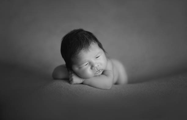 Cute little newborn infant boy stock photo