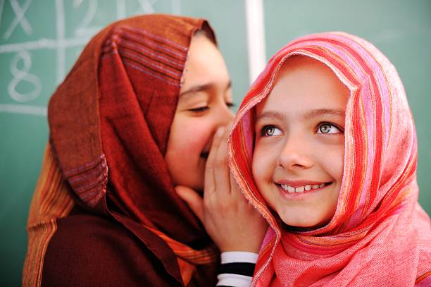 Cute lovely school children at classroom having education activi Cute lovely Arabic school children at classroom having education activities middle eastern culture stock pictures, royalty-free photos & images
