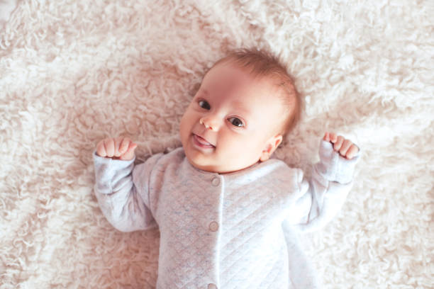 Cute smiling baby boy stock photo
