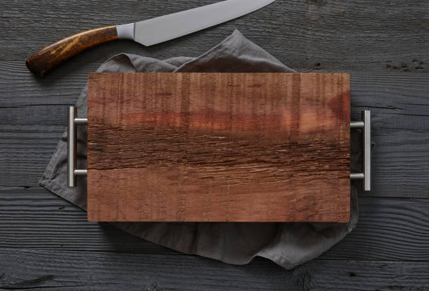 Cutting board and knife stock photo