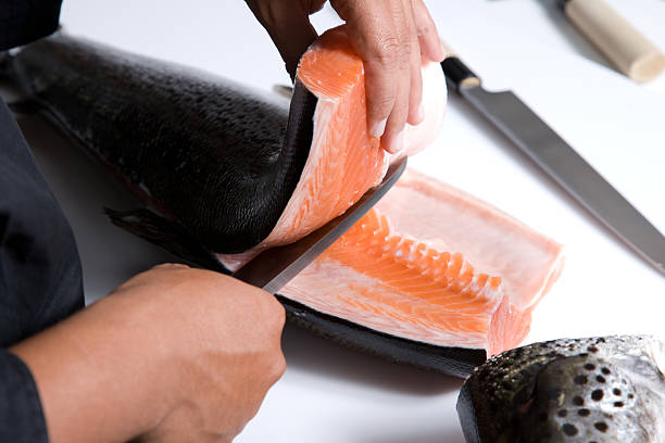 Cutting Fish stock photo