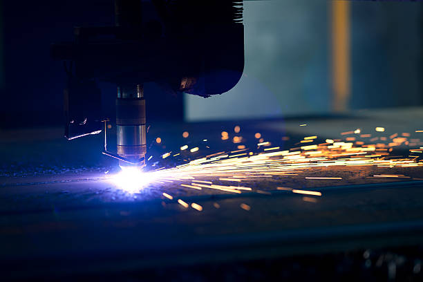Cutting metal with a plasma laser stock photo