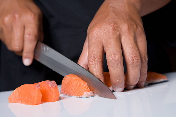 Cutting Sushi stock photo