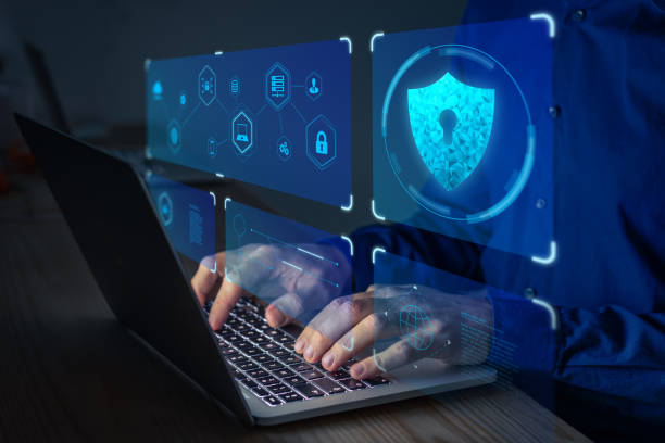 Cyber security expert working on network and data protection on laptop computer against digital crime. Privacy technology on internet. stock photo