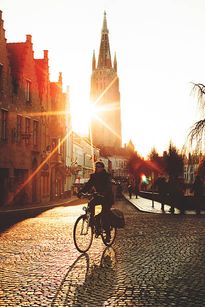 Cycling at sunset stock photo