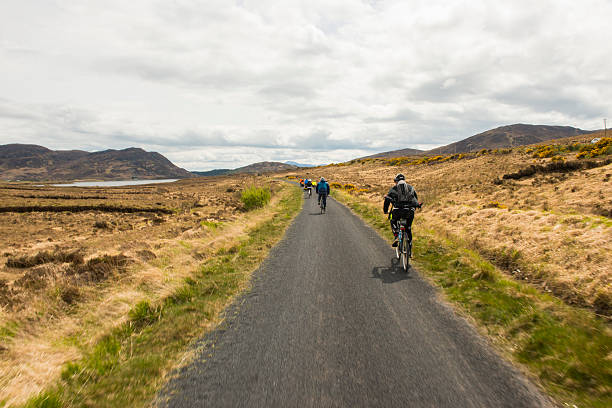 Cyclists in beautiful landscape stock photo