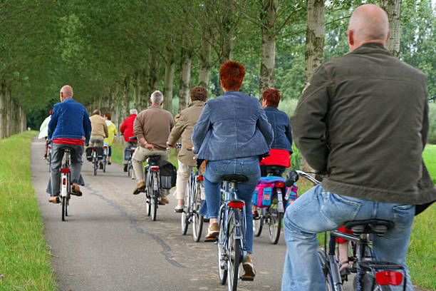 cyclists # 8 - pensioen nederland stockfoto's en -beelden