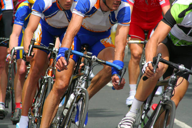 Cyclists race stock photo