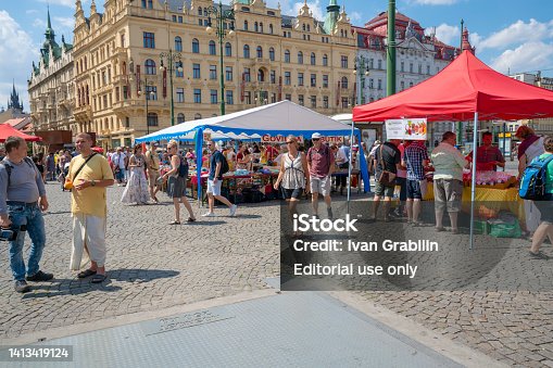 Czech Republic, Prague. People are eating and shopping.