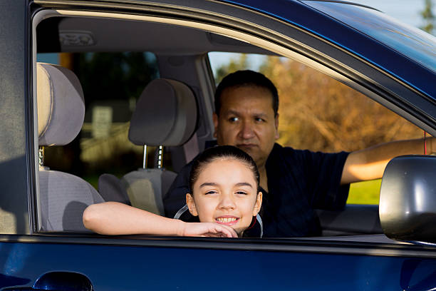 Dad Gets Ready To Drive Daughter To Practice stock photo