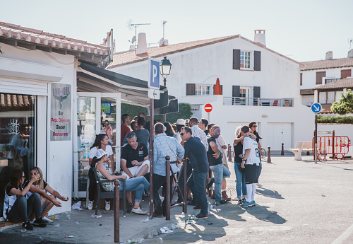 April 18th 2022, Camargue, France: Locals and tourists enjoying afternoon cafe at a Cafe in Camargue, which is one of the most popular destinations in Southern France.