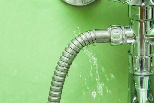 Damaged leaking water tap hose in the bathroom of house, flat or other place. Plumbing concept. Damaged leaking water tap hose in the bathroom of house, flat or other place. Plumbing concept. Burst Pipe stock pictures, royalty-free photos & images